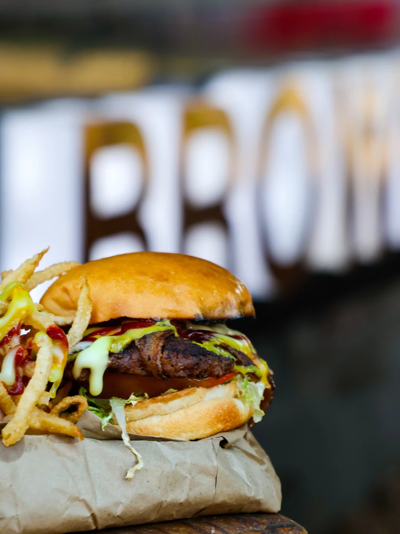 Burger photographed against a softly blurred background