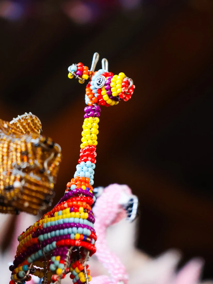 Colourful beaded giraffe decoration